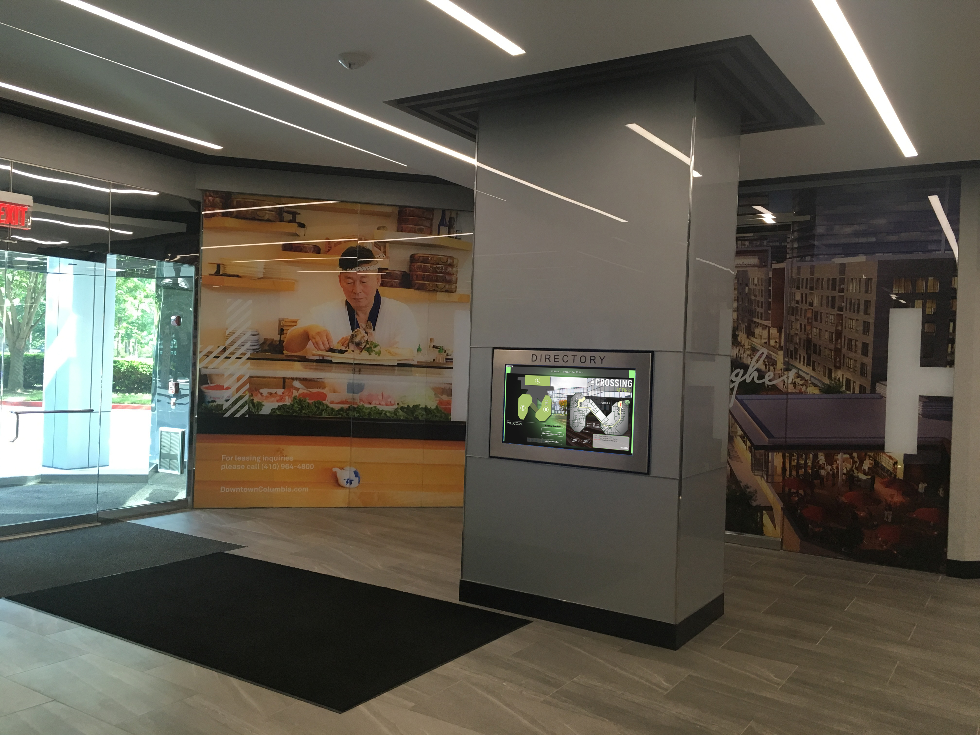 Digital signage in a lobby advertising amenities