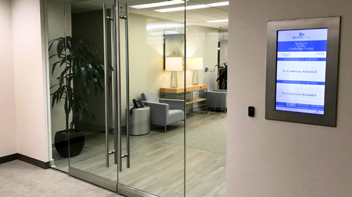 Navigo digital signage proptech for smart buildings CREPM meeting room scheduling screen